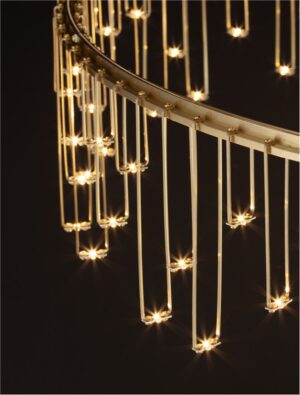 close up image of an led chandelier on a black background